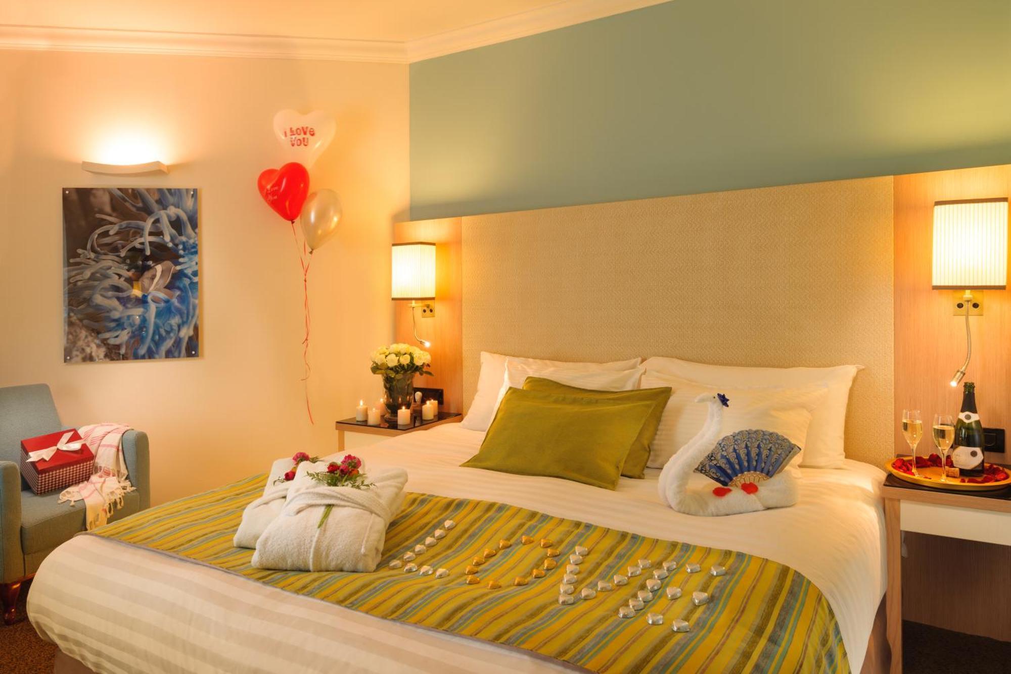U Magic Palace Eilat Exterior foto A room at the hotel